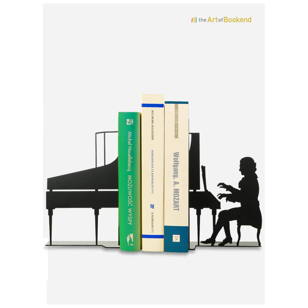 Bookends Wolfgang Amadeus Mozart playing on his piano. Height 19 cm