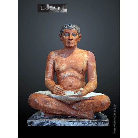 The statue of the egyptian seated scribe discovered in Saqqara in 1850. Exposed in the Louvre museum